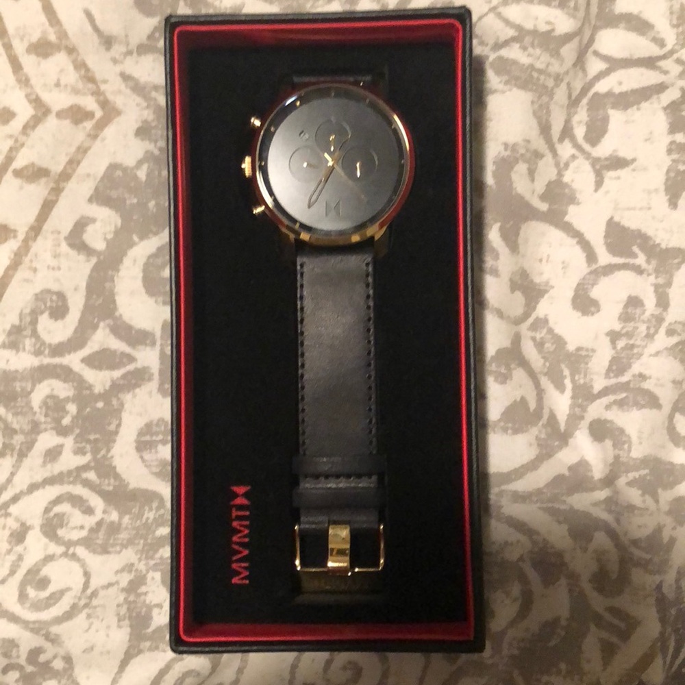 MVMT gold and black watch